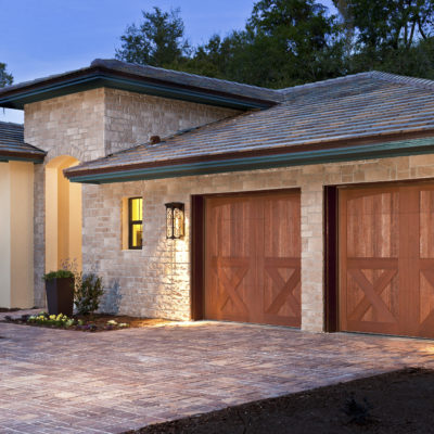 carriage house faux wood garage door by clopay