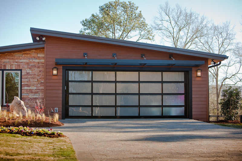 bronze or black metal and glass garage door