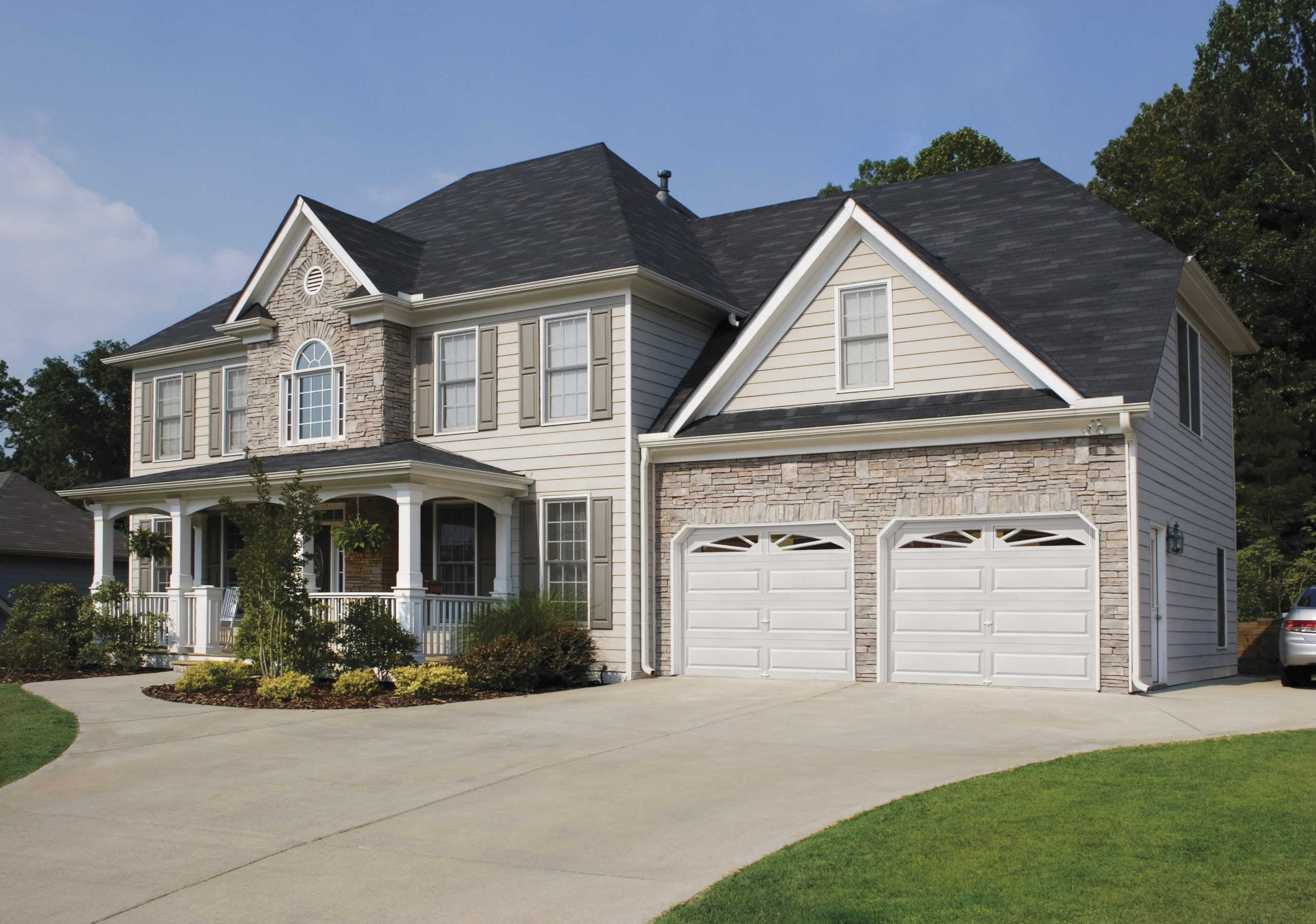 clipped corner garage doors with windows by clopay