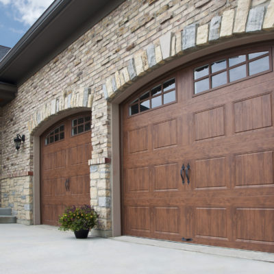 rustic steel arched garage doors by clopay
