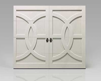traditional white wood garage door by clopay