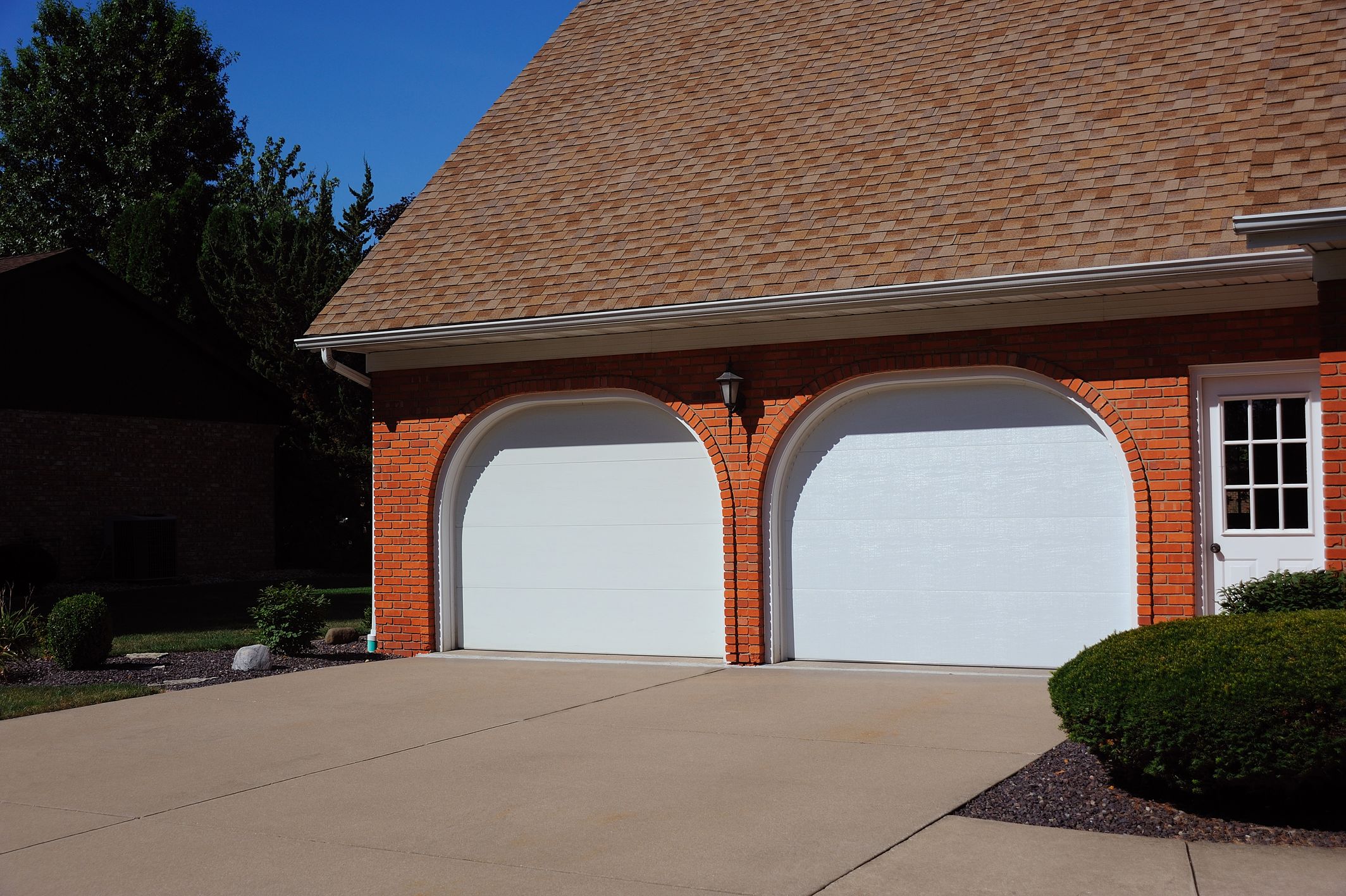 arched top white flush panel garage doors by chi ohd