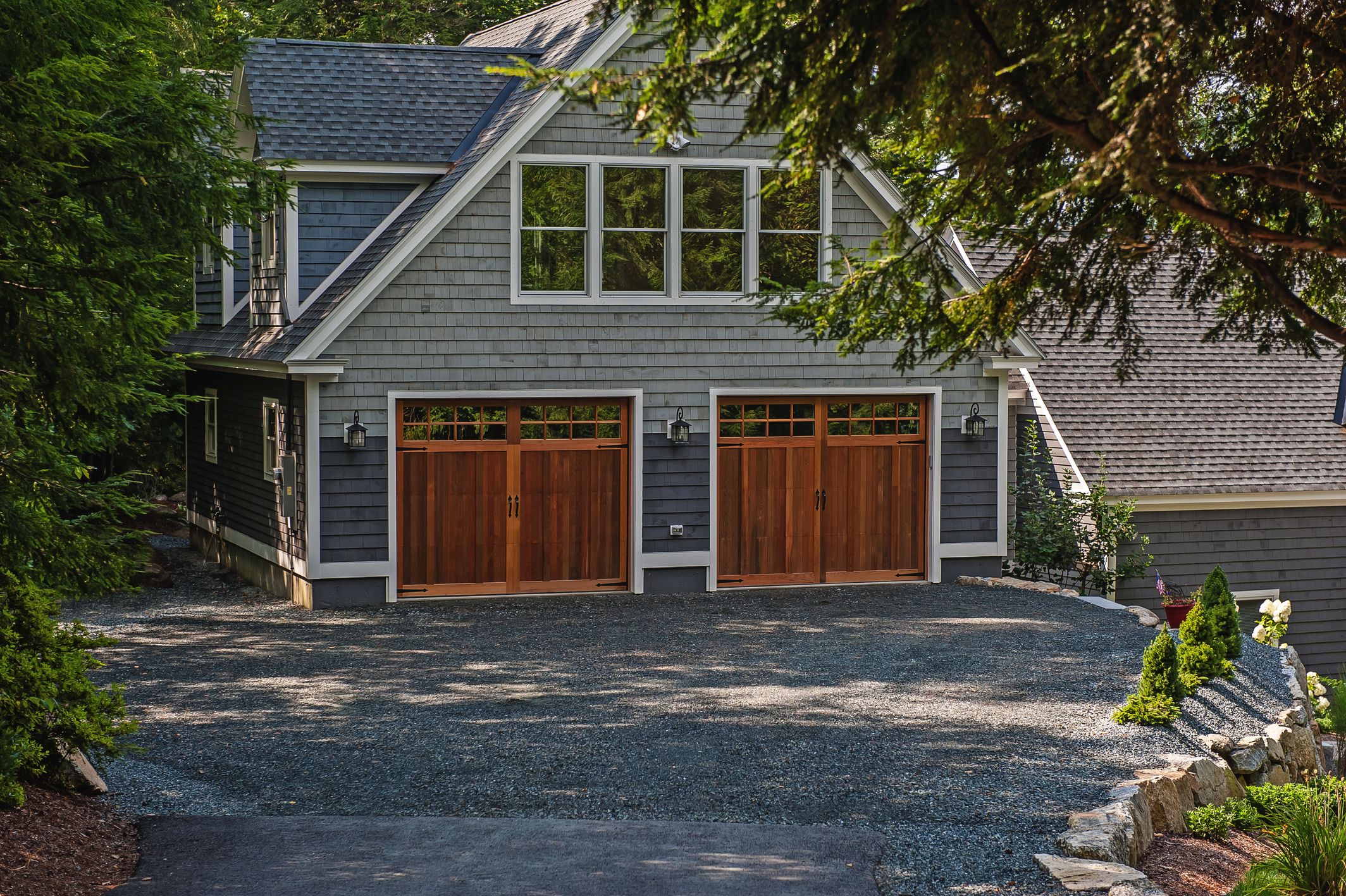 cedar wood garage door with craftsmen style windows by chi ohd