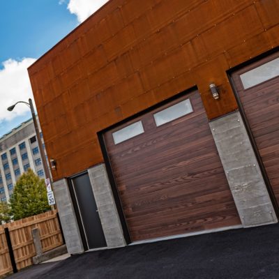 chi overhead wood planks garage door with two windows