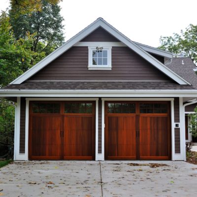 dark stained cedar carriage house garage door by chi ohd