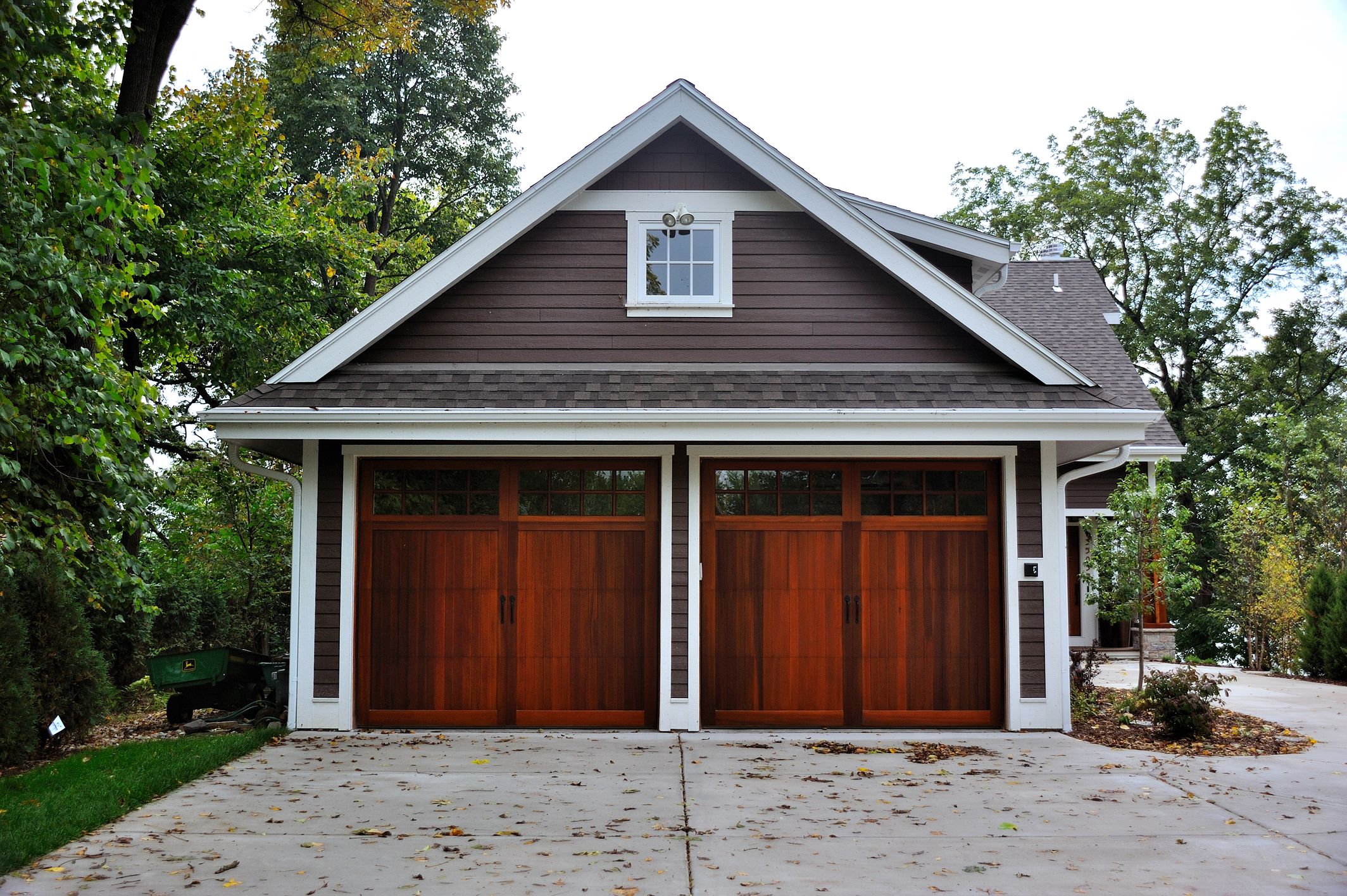 dark stained cedar carriage house garage door by chi ohd