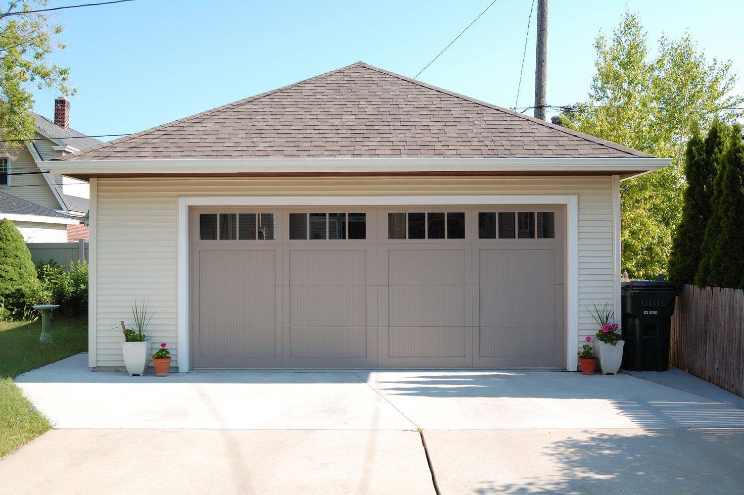 fiberglass carriage style garage door with windows by chi ohd