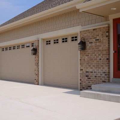 greige garage door with lights