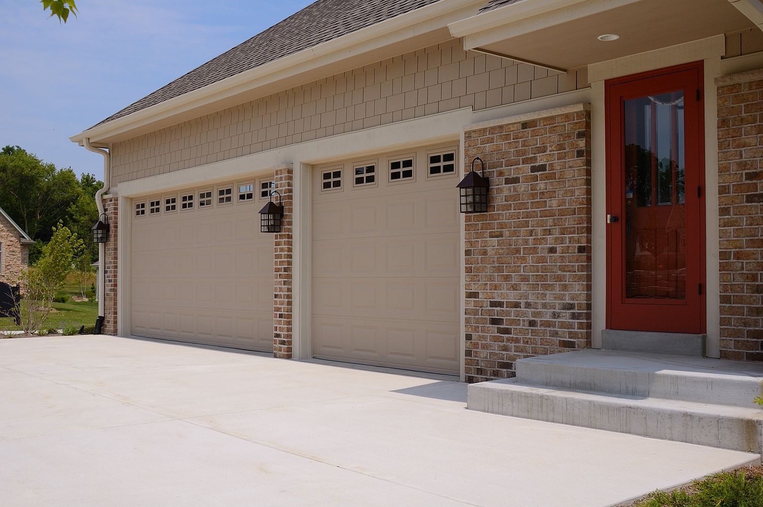 greige garage door with lights