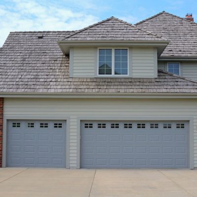 light blue two car and one car garage door in steel by chi ohd