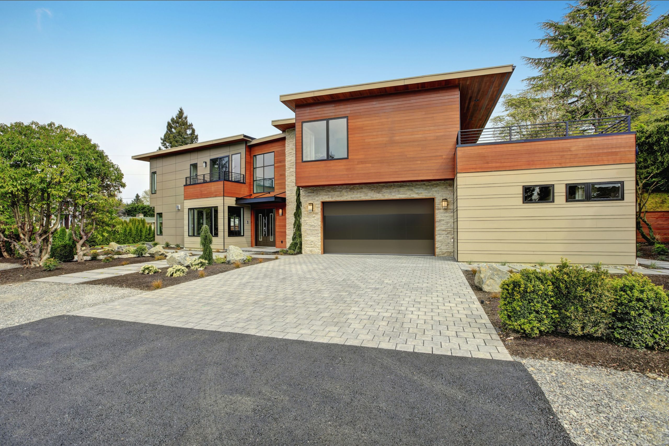 modern two tone garage door with tinted glass