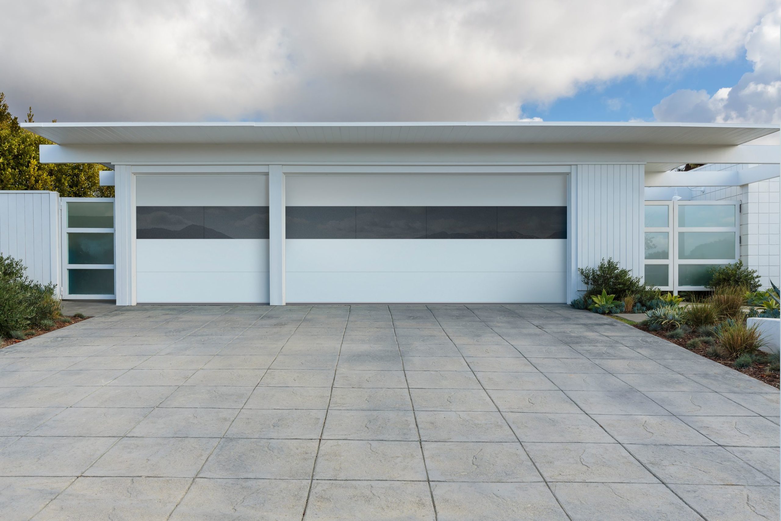 modern white garage door with one long window