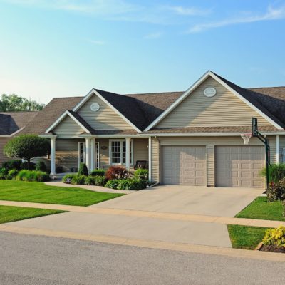 one car garage doors side by side in tan by chi ohd