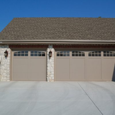 tan single and two car garage doors with arched windows by chi ohd