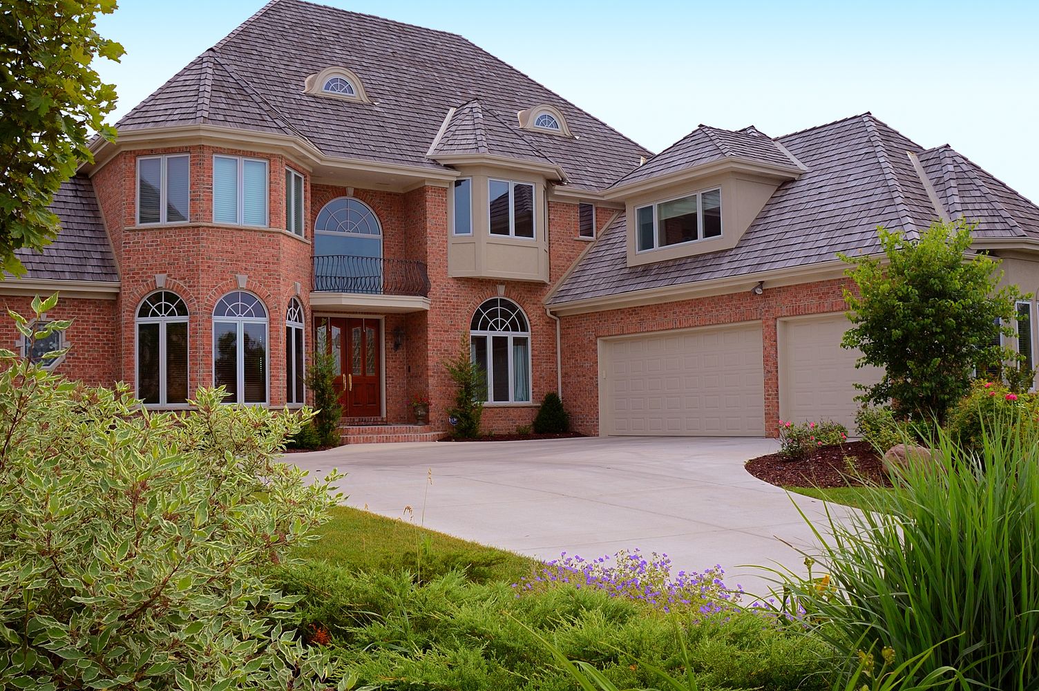 tan two car and one car steel stamped garage doors by chi ohd