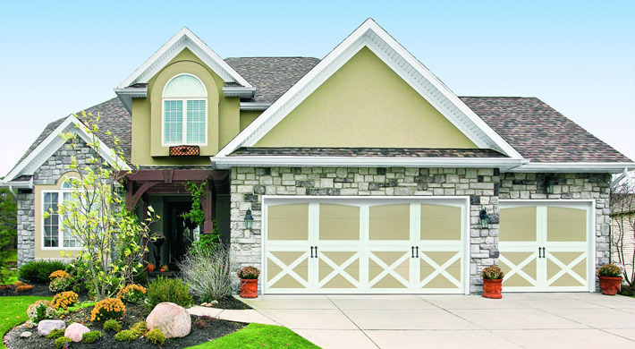 two tone carriage house style garage door by amarr