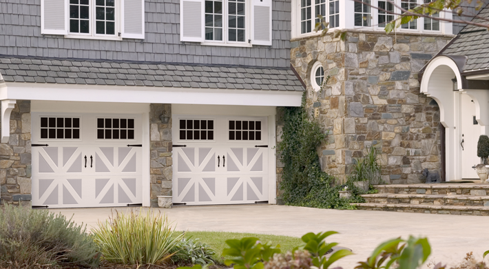 two tone steel carriage style garage door by clopay