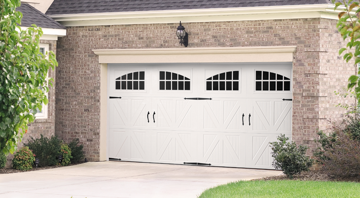 all white steel wood grain garage door by amarr