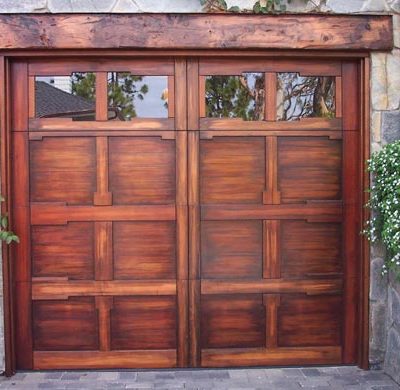 custom stained wooden garage door carriage style