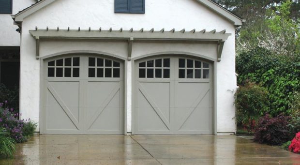 one car eyebrow garage door with windows