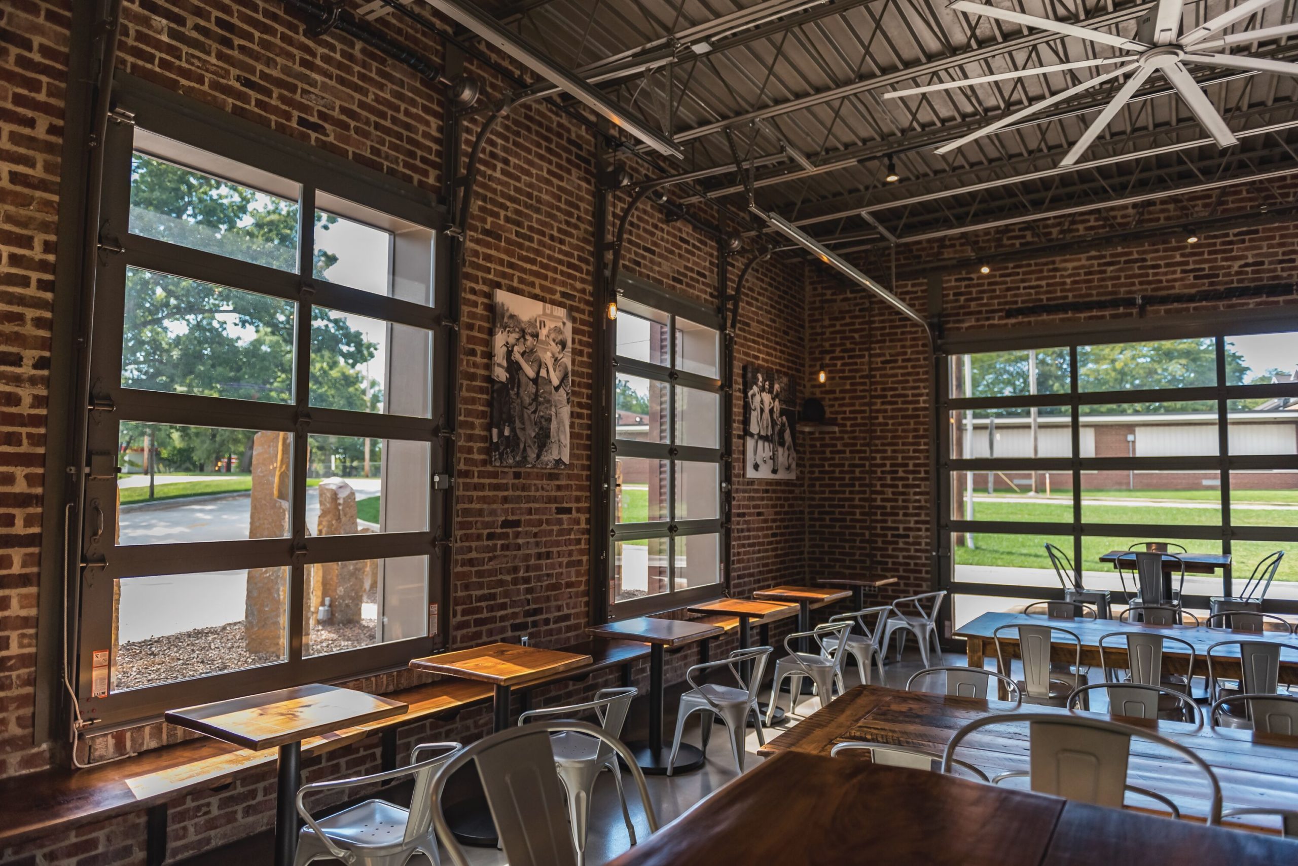 glass garage doors for a restaurant by chi ohd