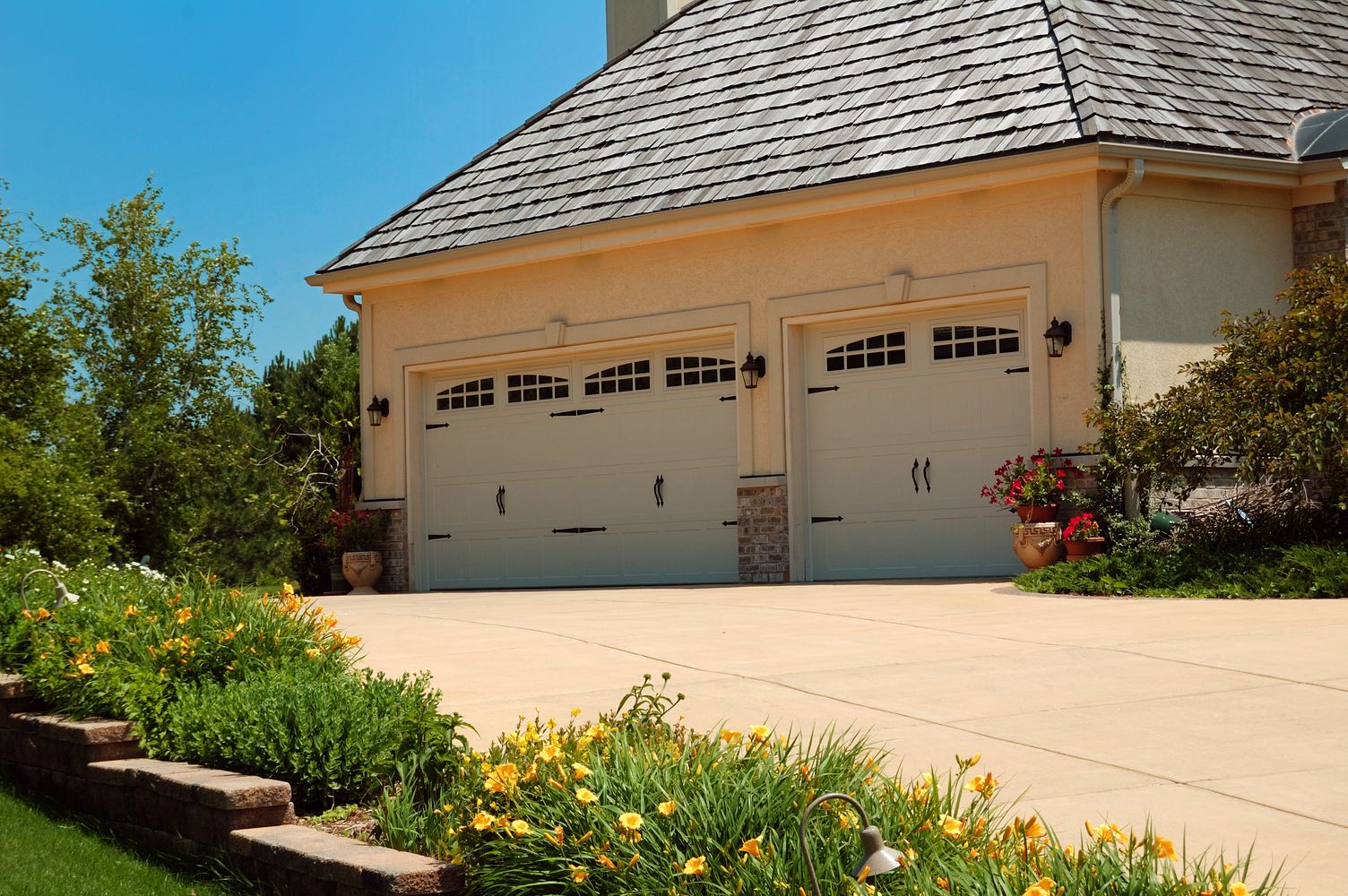 stamped carriage house garage door clay by chi overhead