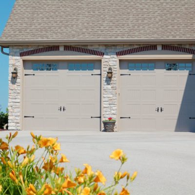 stamped carriage house garage door short panel with hardware by chi overhead