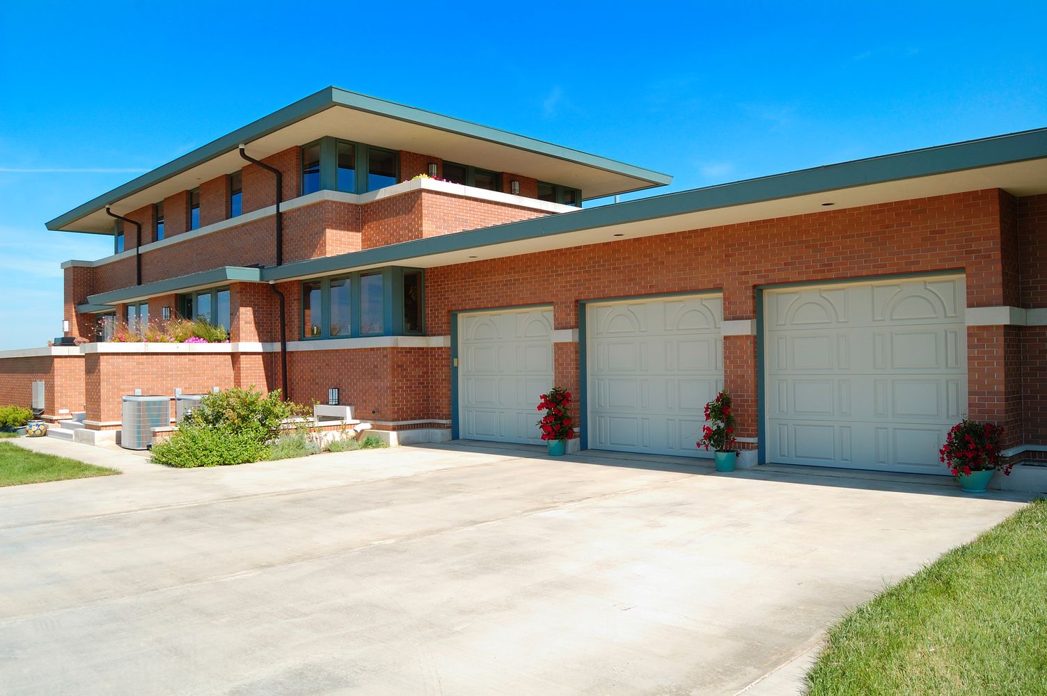 three one car garages side by side