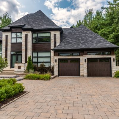 walnut wood finish garage door by chi overhead