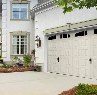 two car tan steel carriage house garage door by amarr