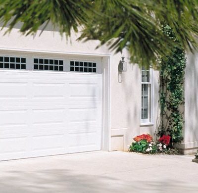 traditional style steel garage door with windows by amarr