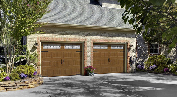 woodgrain steel affordable carriage style garage doors by amarr