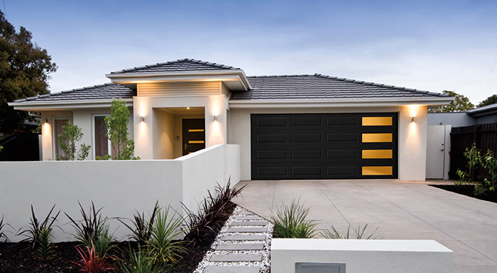 dark long panel garage door with windows by amarr