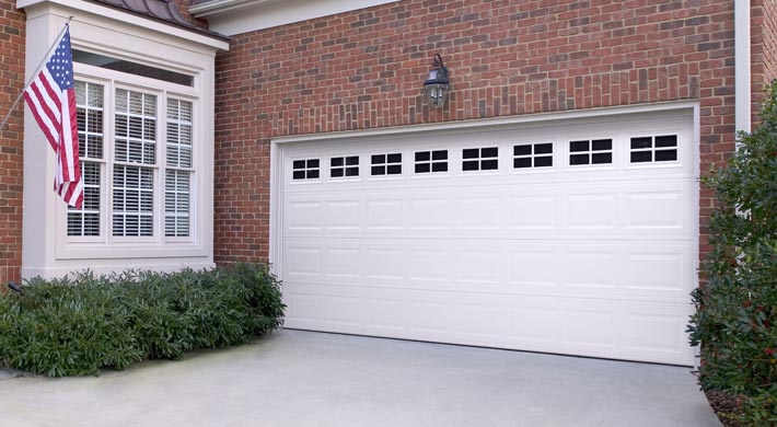 white traditional steel garage door by amarr