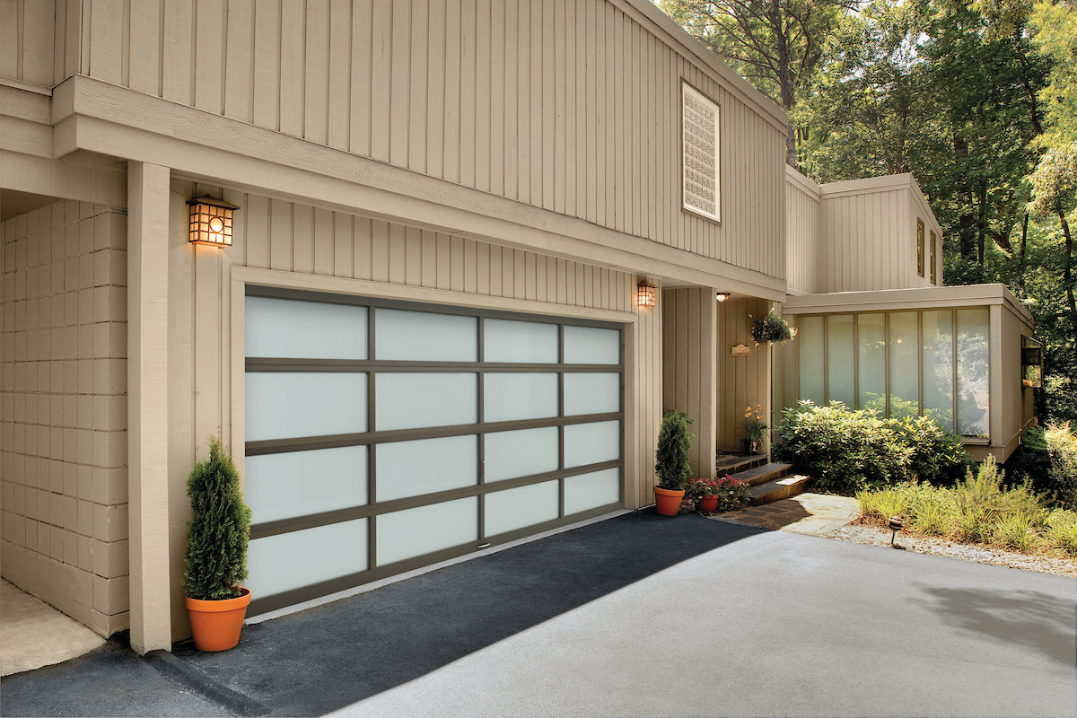 Amarr Vista full view modern garage door in bronze with whiteout glass