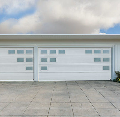 mosaic style garage door with multiple windows by amarr