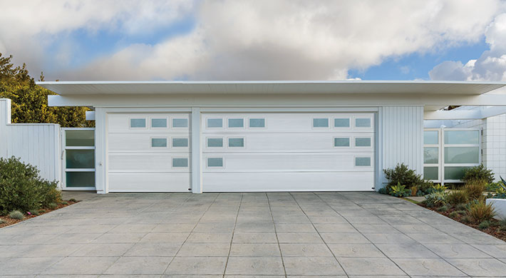 mosaic style garage door with multiple windows by amarr