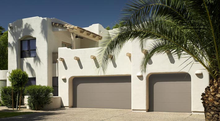 flush panel spanish style garage door by amarr