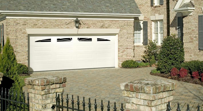 steel two car garage door with eyebrow windows by amarr