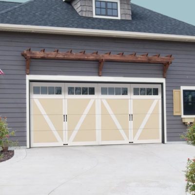 overhead courtyard wind load garage door with classic carriage house design