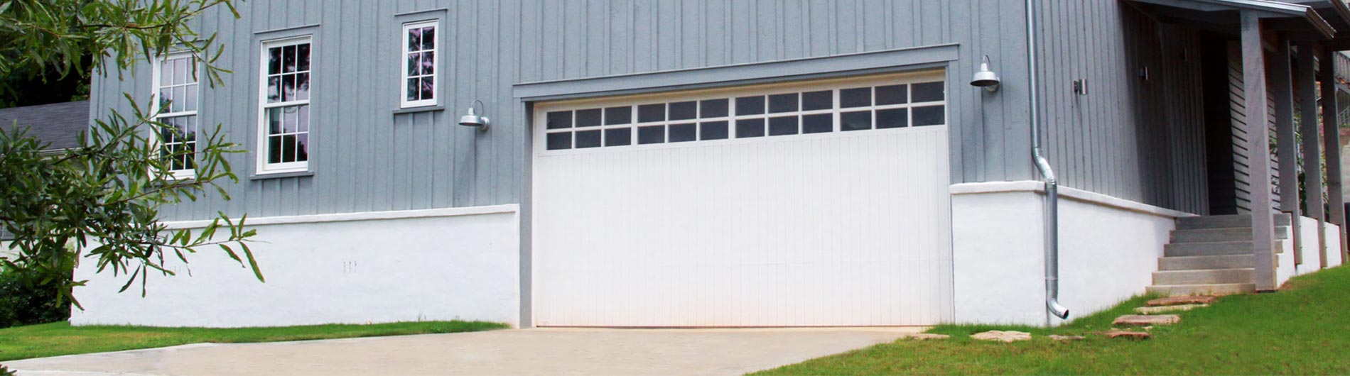 flush wood white garage door with windows