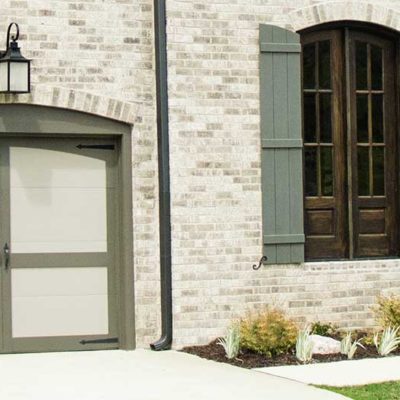 two tone steel carriage house garage doors