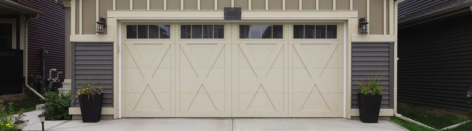 cream garage door with x's and windows