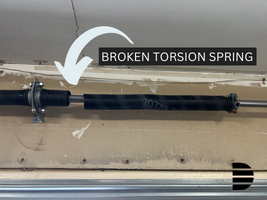 what does a broken torsion spring look like