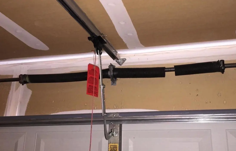 Can I Open My Garage Door if the Spring Is Broken? - Doorvana Garage Doors