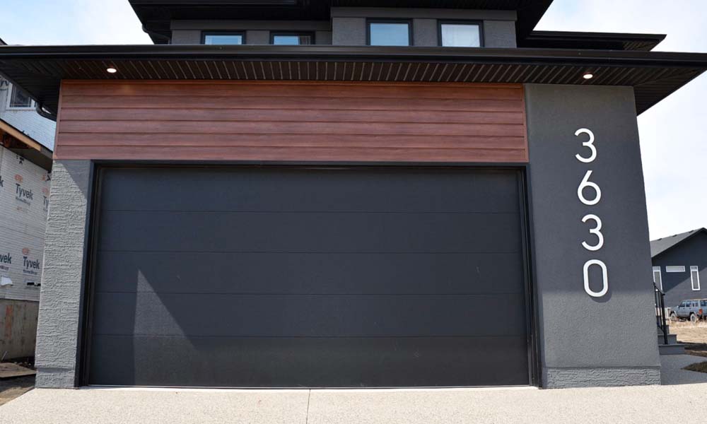 Black CHI Flush Panel garage doors.