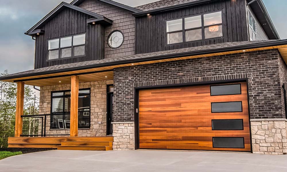 CHI Plank garage doors with glass panels.