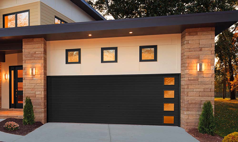 Modern Clopay garage door with short panel windows on the right side.