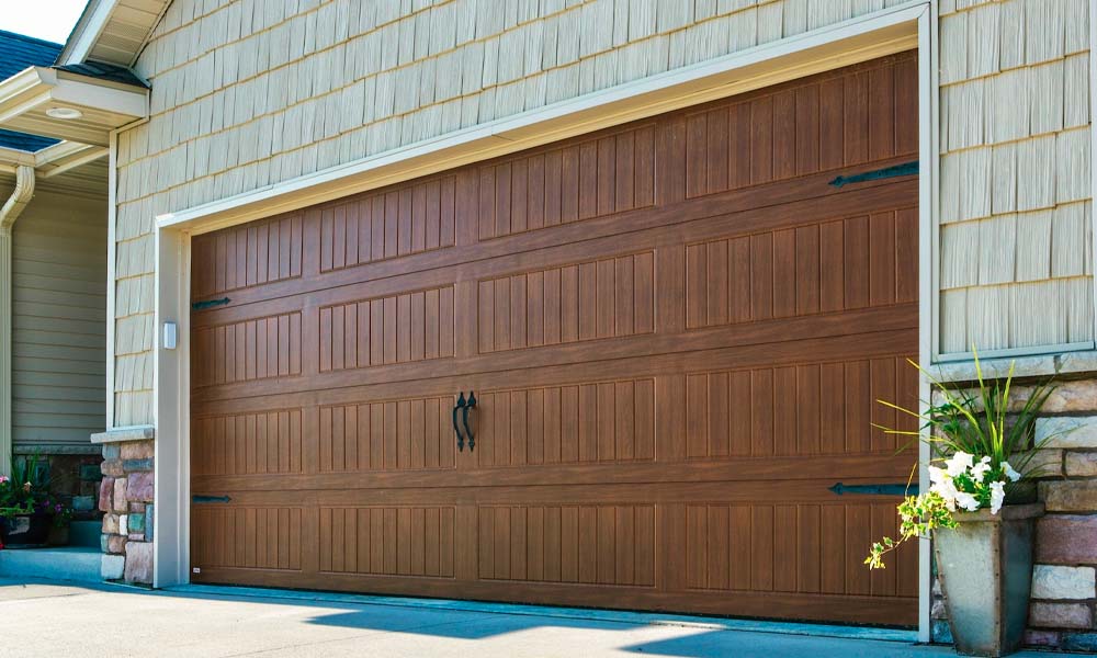 Overhead garage door, double car wide.