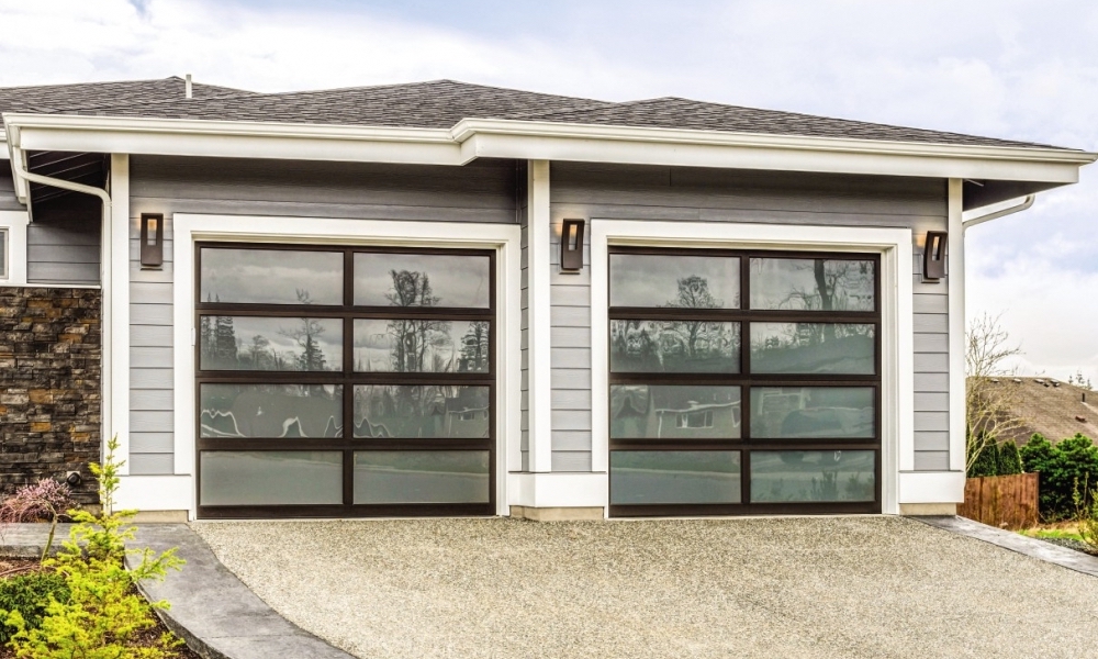 Two modern Overhead garage doors on two car garage.